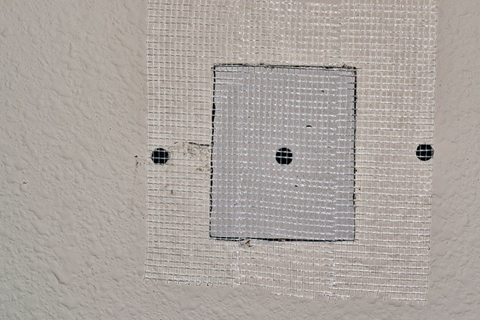 Replacing chunk of drywall with mesh on top