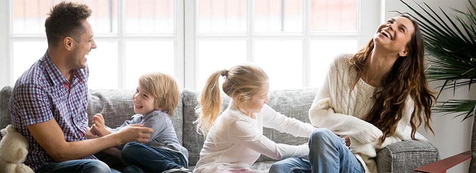 Family playing in living room